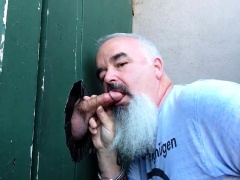 Horny daddy putting his mouth to work on a mystery cock