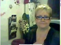 Hot blonde milf with big tits teasing on the webcam